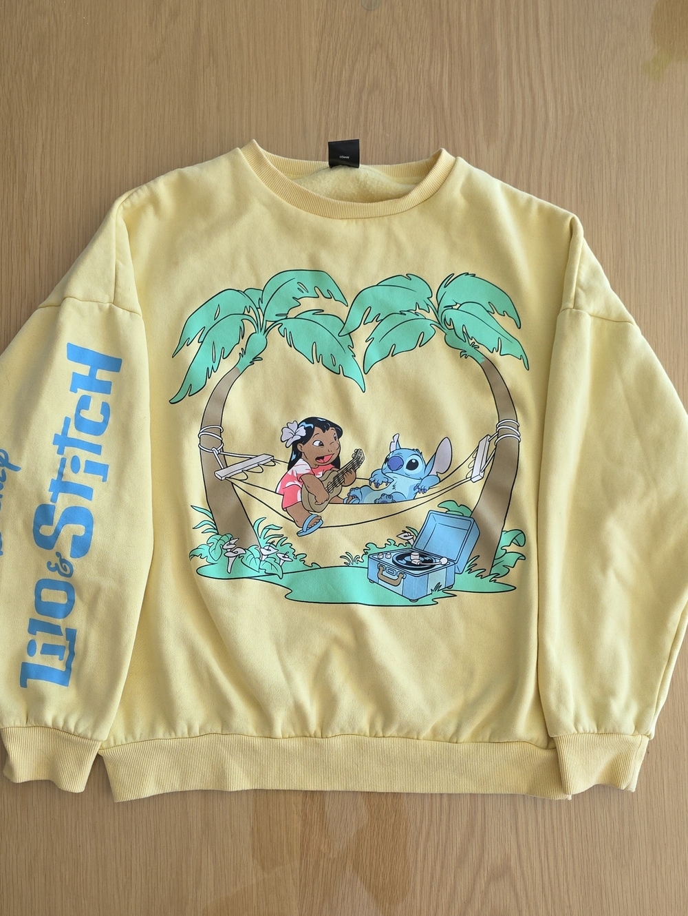 Disney Lilo & Stitch Pale Yellow Graphic Crewneck with Teal and Blue Art